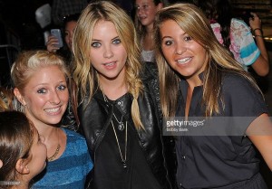 Ashley Benson with fans during Fashion's Night Out on September 8, 2011 in New York City