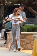 Apple Martin grabs a cake at Pavilions Market with her father Chris Martin in Malibu, CA 23/06/2018