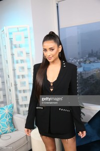 Actress Shay Mitchell poses on the Daily Pop set
