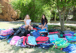 Maddie and Mackenzie Ziegler - Pack 750 backpacks to donate to foster kids and homeless teens in Los Angeles, 2018-07-30