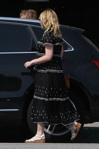 Kirsten Dunst - showing her growing baby bump while out for shopping at