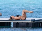 Lizzie Cundy - black swimsuit on the beach in Barbados 01/02/2019