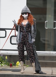 Phoebe Price - Wears a mask to protect her from the coronavirus while walking her dog in Beverly Hills 03/13/2020