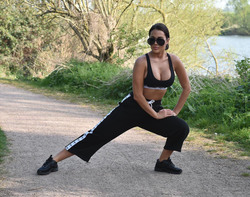 Yazmin Oukhellou - Stretching in a park in Essex 04/12/2020