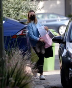 Olivia Wilde moving some bulky items to her Los Angeles home on February 14, 2021