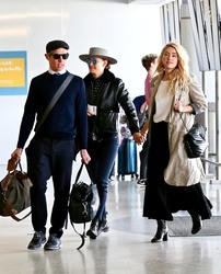 Amber Heard and girlfriend Bianca Butti depart from LAX Airport in Los Angeles 03/07/2020
