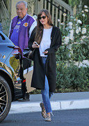 Dakota Johnson tips the valet after a lunch meeting at the San Vicente Bungalows in West Hollywood, CA (January 7, 2020)