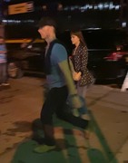 Dakota Johnson and Chris Martin hold hands while exiting the Global Citizen Festival together (September 28, 2019)